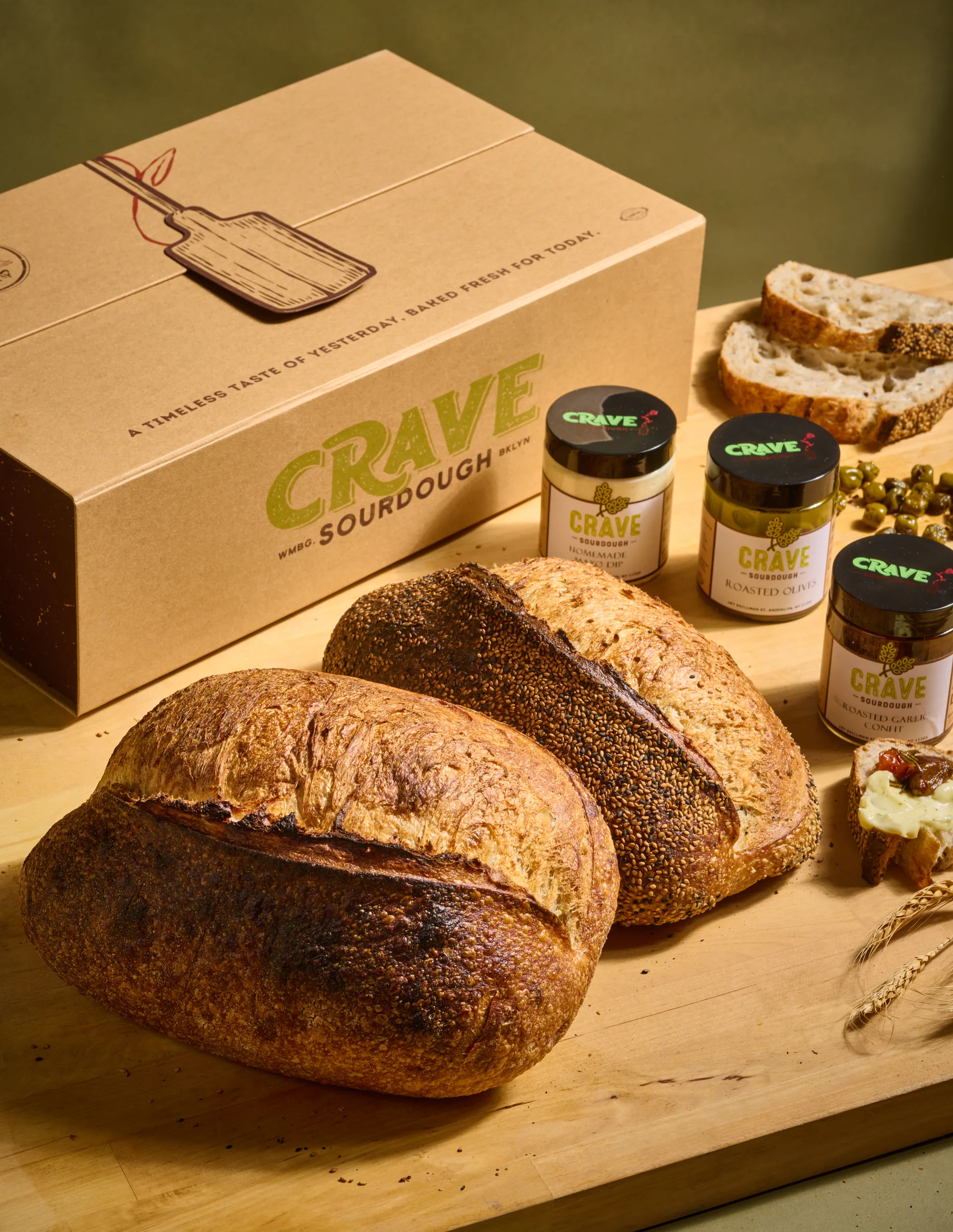 Crave Sourdough artisan gift box with loaves and homemade dips